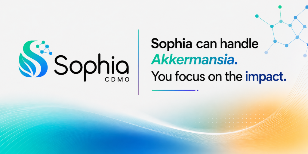 Wide Sophia CDMO biotech banner on a clean white background with blue, teal, and warm gold wave graphics. The left side features the Sophia CDMO logo, while the right side displays the slogan “Sophia can handle Akkermansia. You focus on the impact.” with subtle molecular network graphics and a modern pharmaceutical design style.